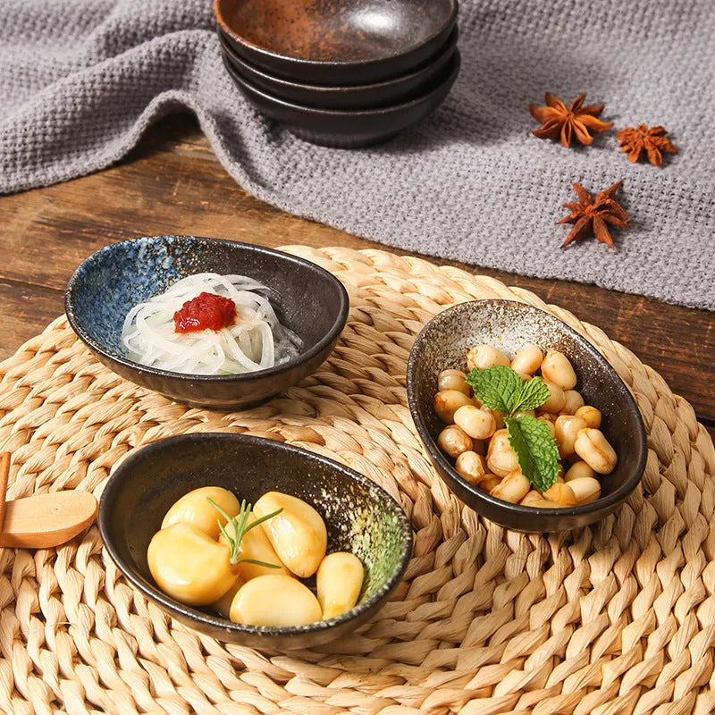 Japanese ceramic oval sauce dipping bowl with decorative pattern