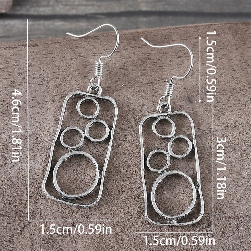 Geometric round ring earrings with irregular square shapes in antique silver finish
