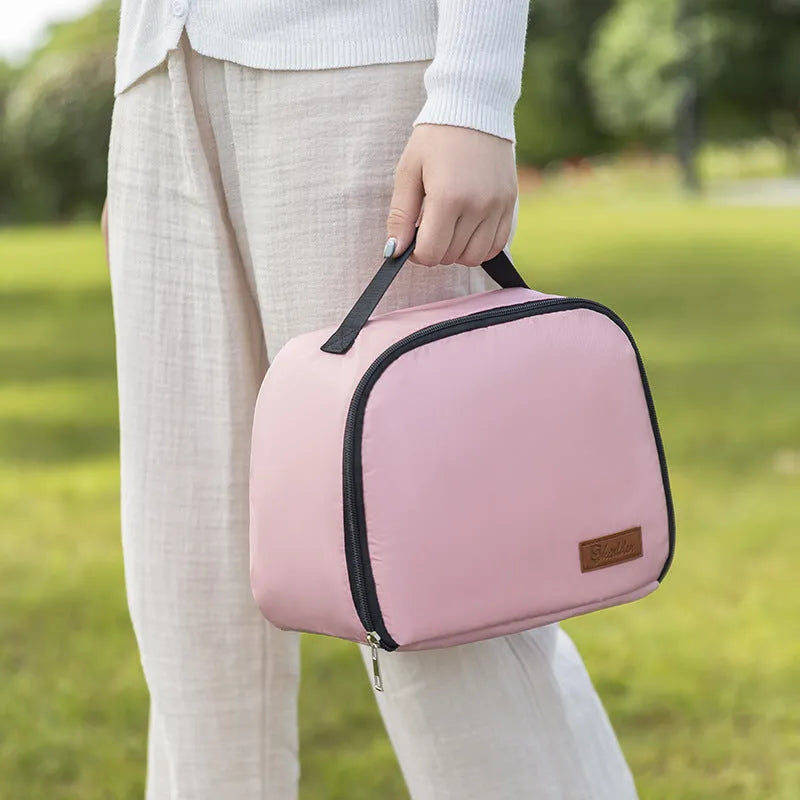 Insulated large capacity bento handbag in textured cloth, shown in purple colour.