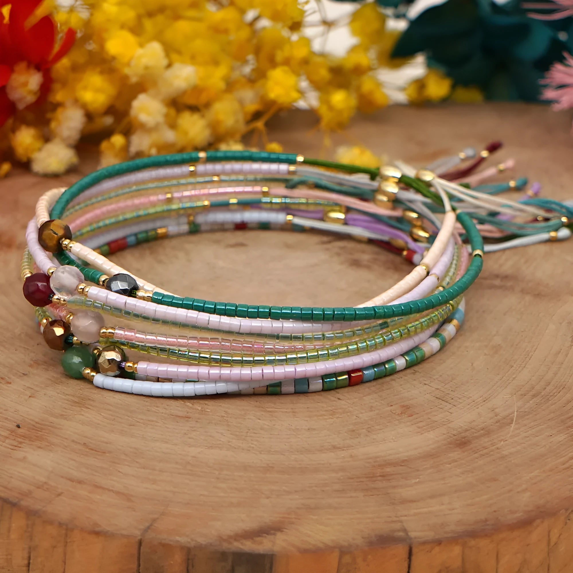 Handmade colourful bohemian bracelet with geometry beads in glass and coloured glaze
