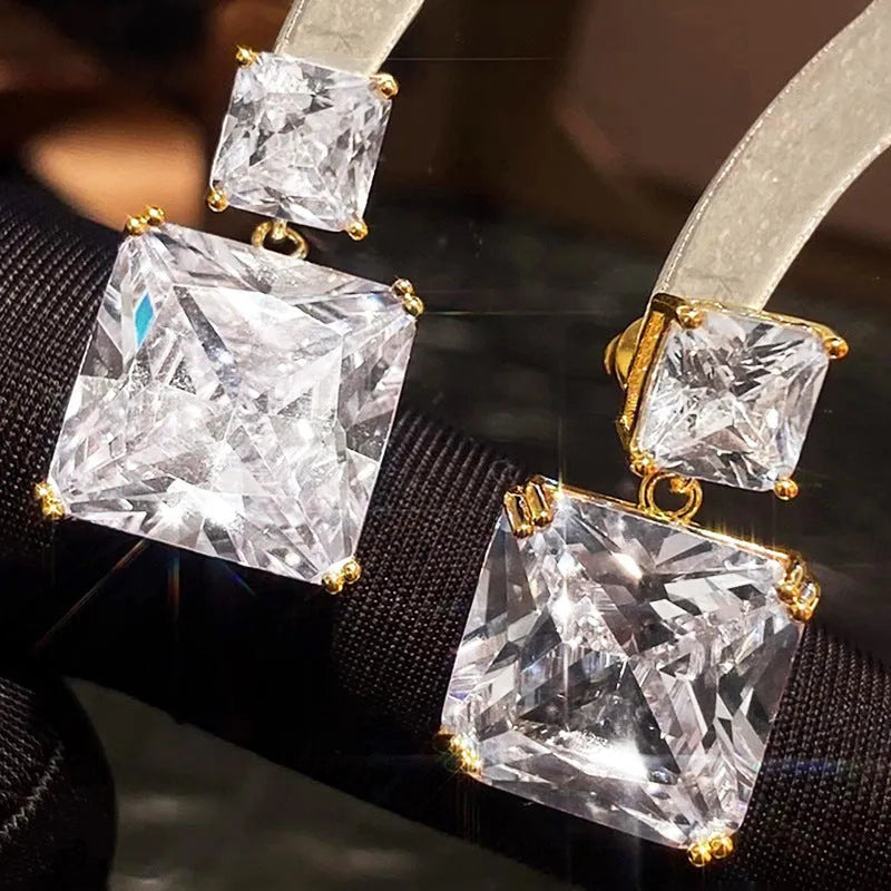 Geometric square copper earrings with quadrilateral design in white gold and gold colour finishes