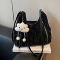 Soft black PU ladies fashion backpack with pendant, shown alongside blue, silver, and milky white colour options.