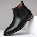 Men's black pointed Chelsea boots with low heel and rubber sole
