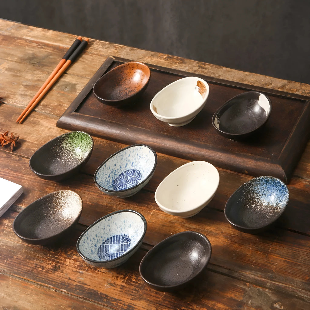 Japanese ceramic oval sauce dipping bowl with decorative pattern