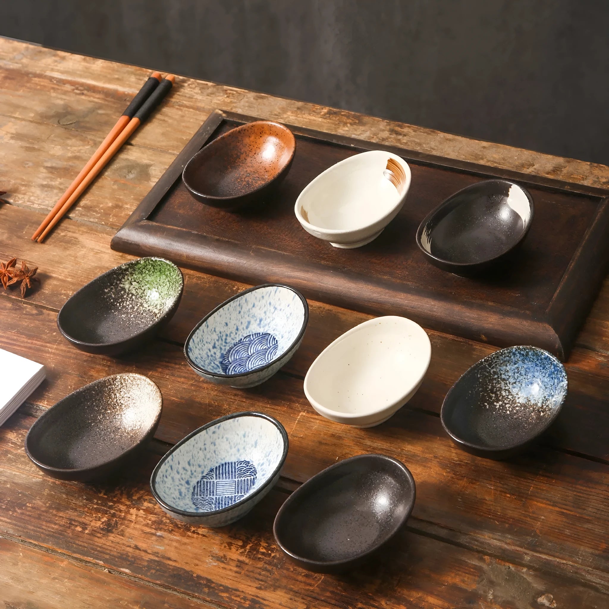 Japanese ceramic oval sauce dipping bowl with decorative pattern