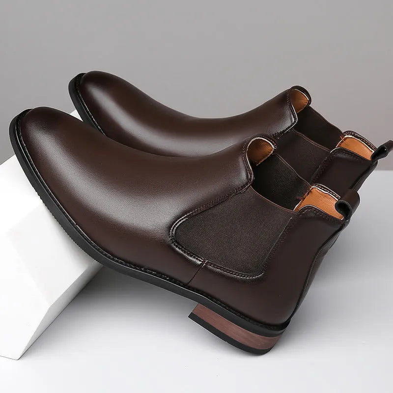 Men's black pointed Chelsea boots with low heel and rubber sole
