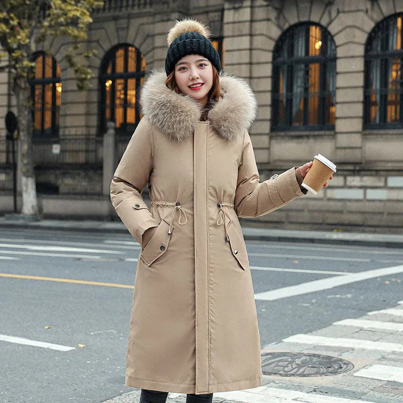 Women's long white trench coat with 100cm length, cotton-padded construction, and elegant style long sleeves