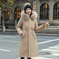 Women's long white trench coat with 100cm length, cotton-padded construction, and elegant style long sleeves