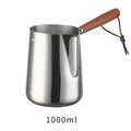 Stainless steel coffee cup with measurement scale and wooden handle in simple design