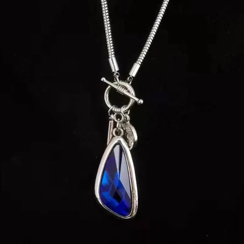 Geometric plaid pendant on snake bone chain necklace measuring 50 cm length
