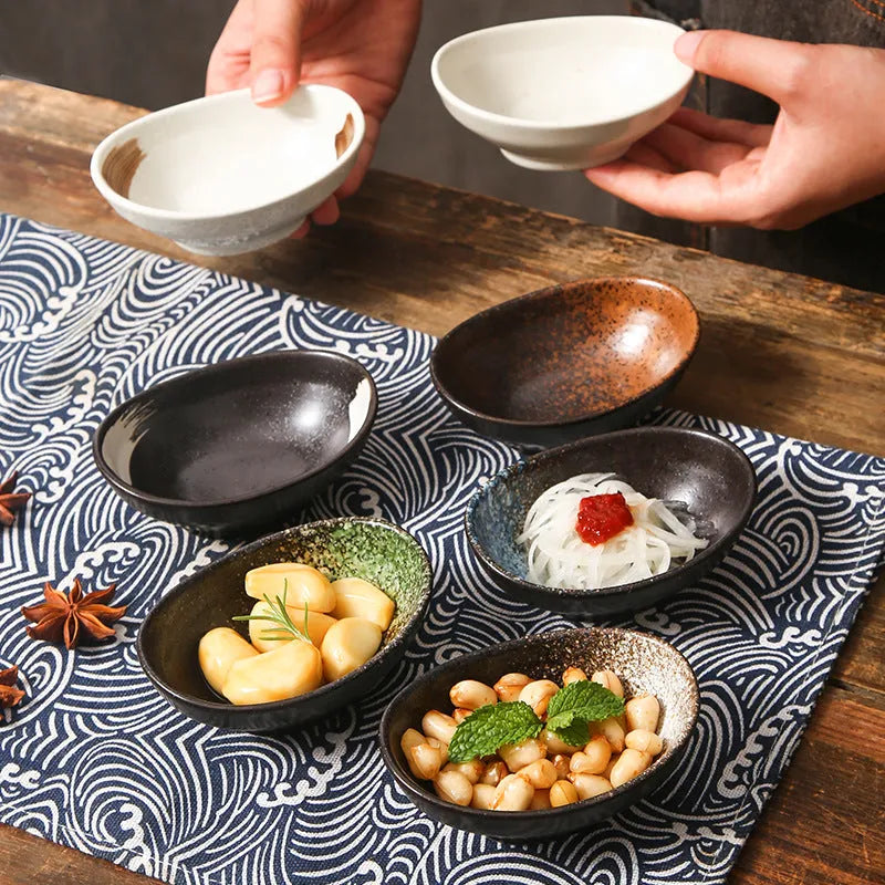 Japanese ceramic oval sauce dipping bowl with decorative pattern
