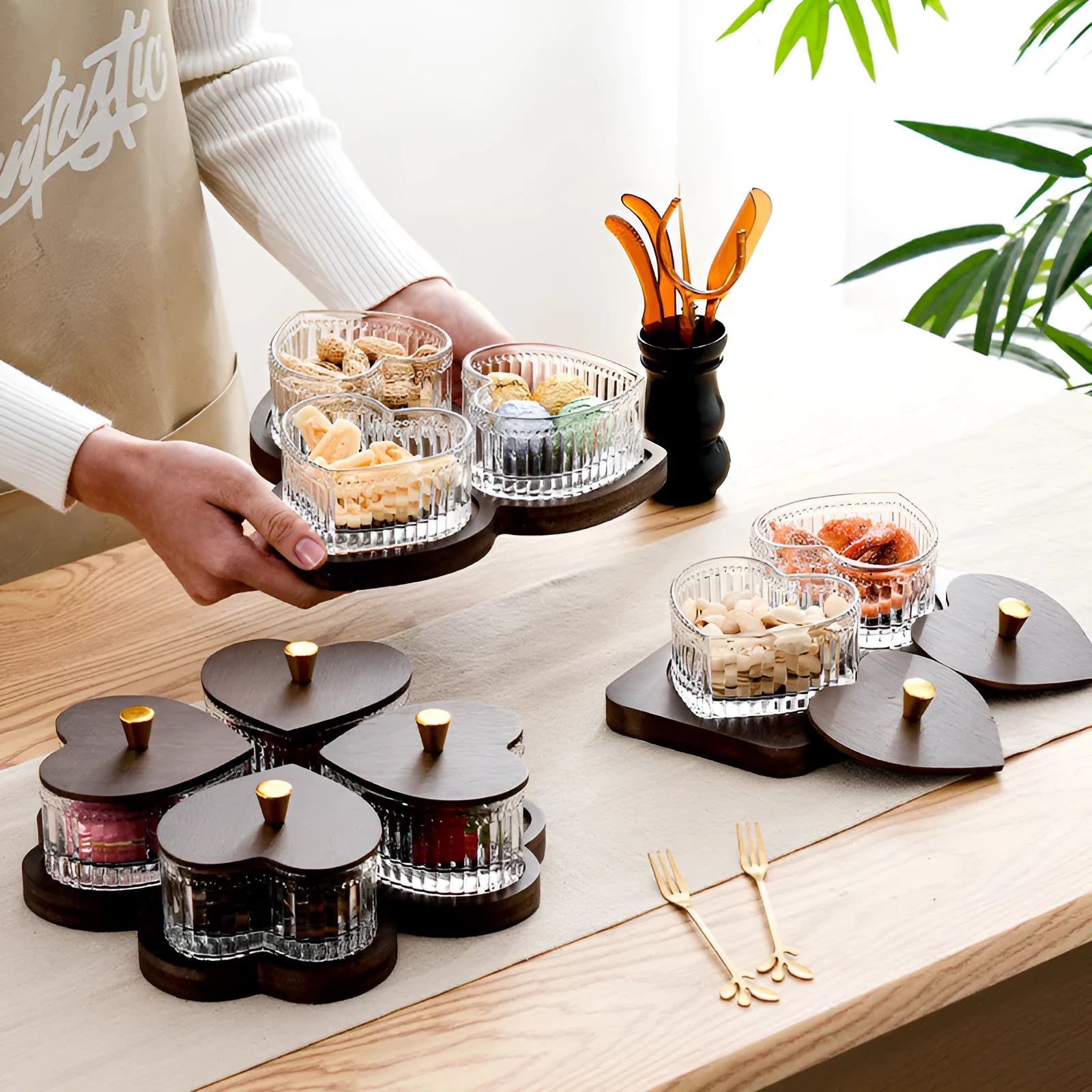 Glass snack platter with coloured glaze and transparent heart-shaped lids in retro style