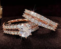 Two fully jewelled geometric round female rings in silver colour with diamond treatment surfaces