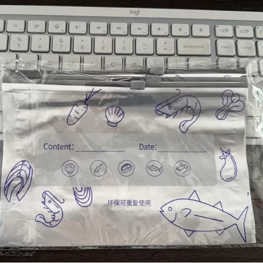 Set of aluminium foil sealed fresh bags and boxes in three sizes for food storage.
