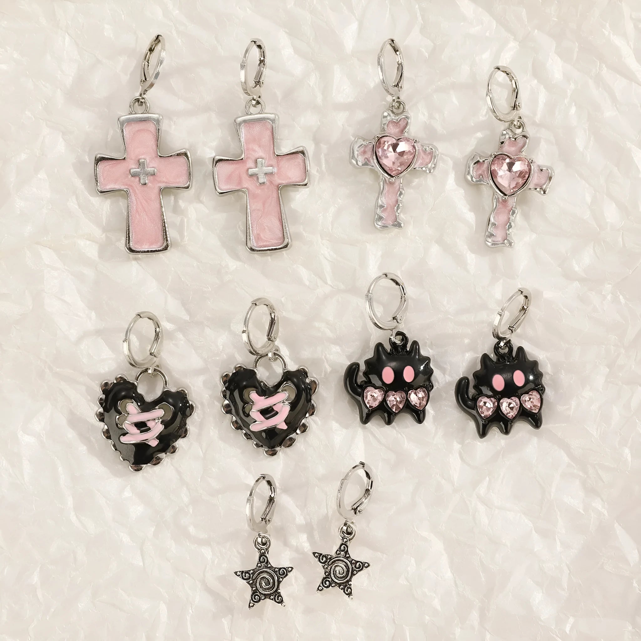 Women's cross crystal earrings with dripping oil treatment in white, black, and silver colour variations
