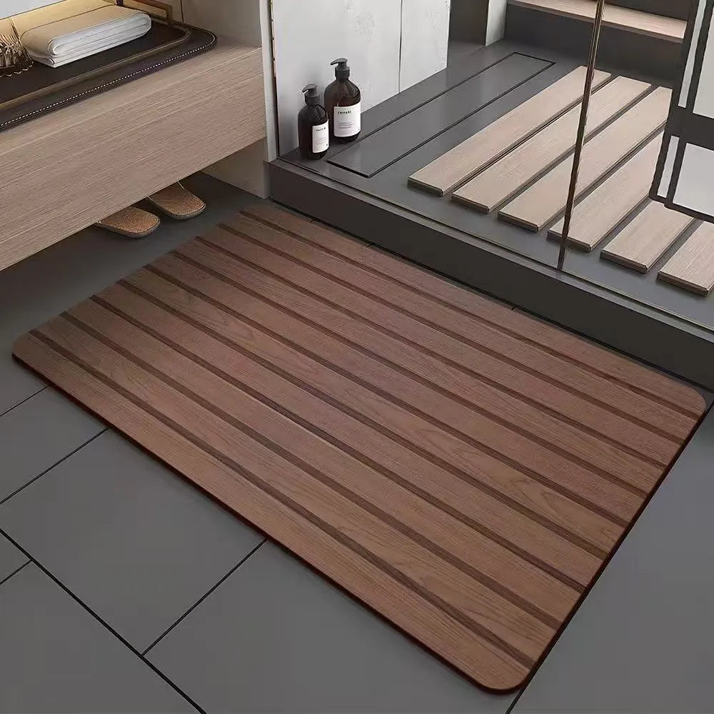 Square diatom ooze floor mat with geometric wood grain pattern in a shower room setting