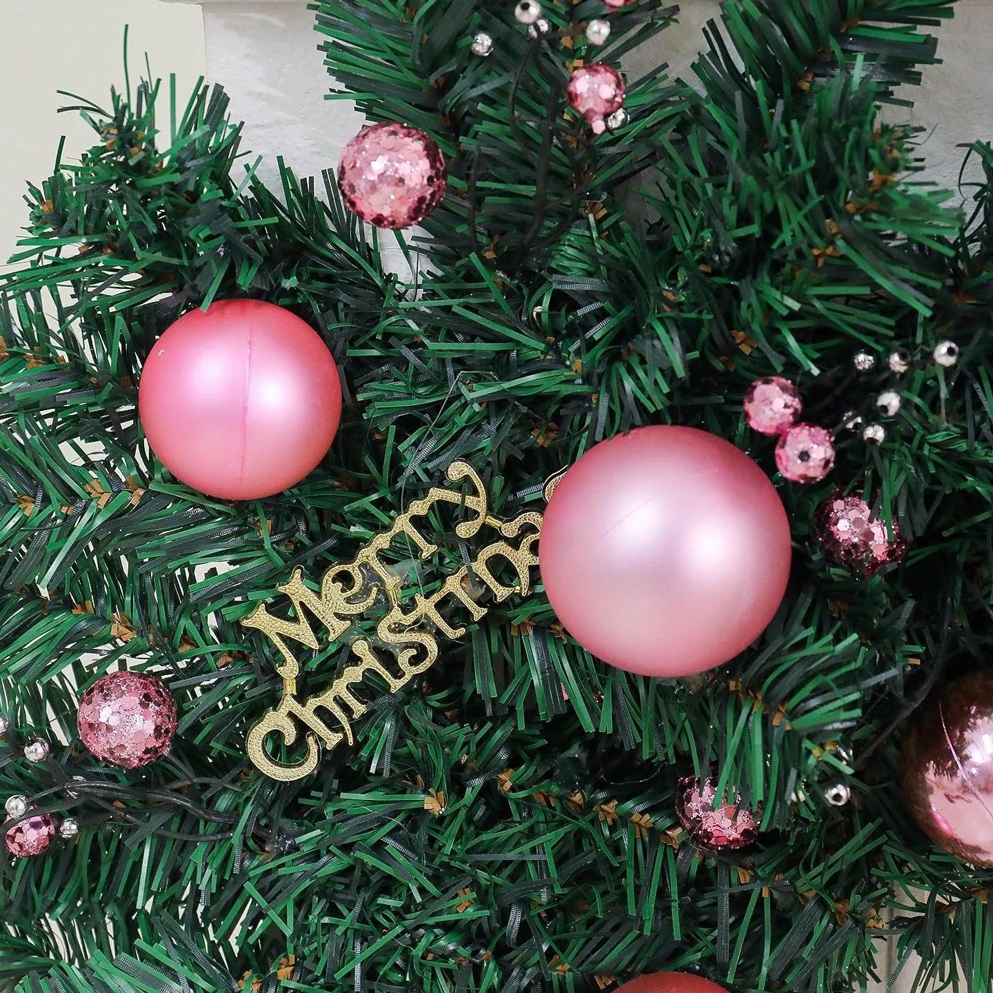 2.7 metre pink rattan Christmas vine decoration with 240 decorative heads on wrought iron wire
