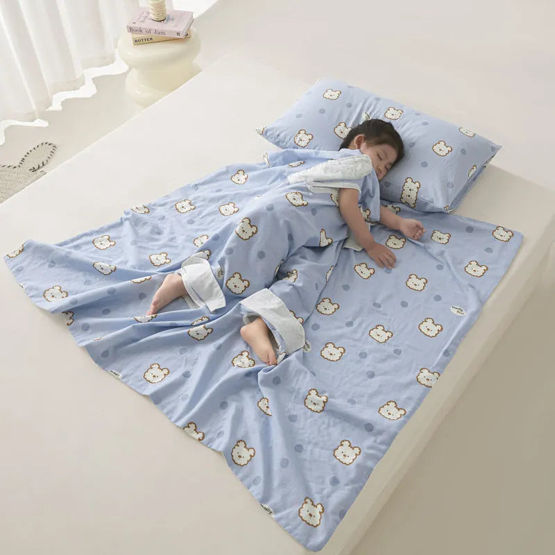 Colourful patterned anti-kick sleeping bag blanket folded to show size and design.