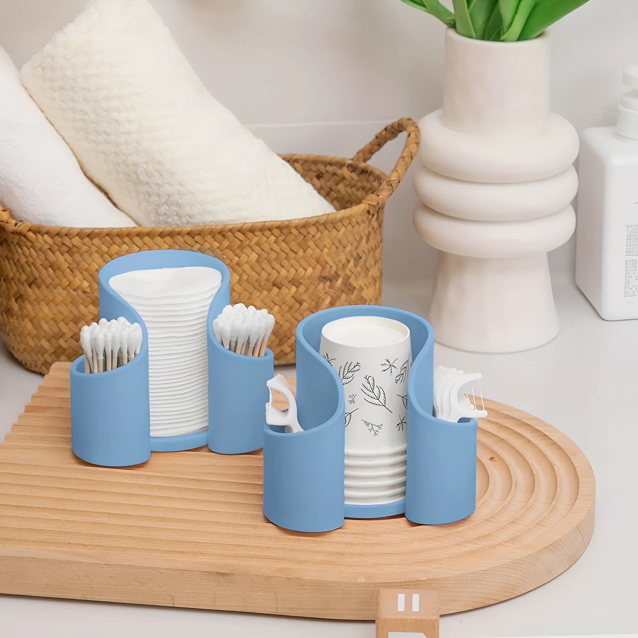 Modern solid colour plastic cotton box for storing dental floss or cotton pads.
