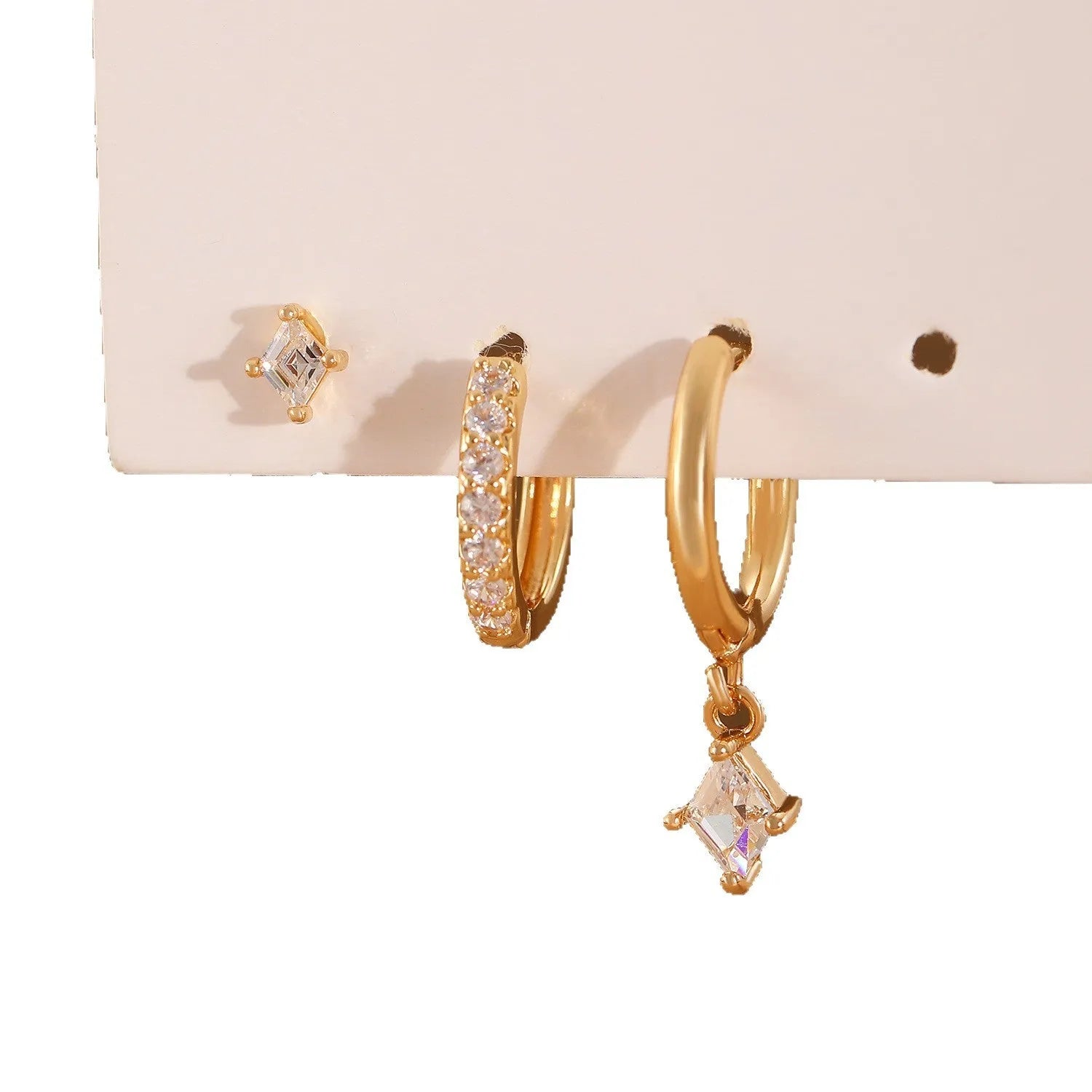 Ladies three-piece geometric earring set with inlaid zircon in gold or white finish
