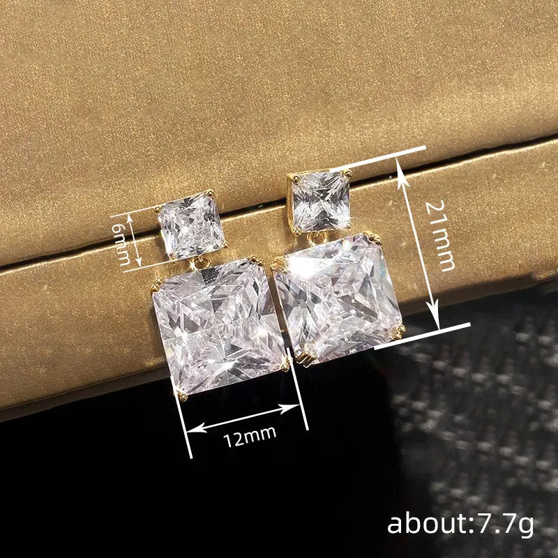 Geometric square copper earrings with quadrilateral design in white gold and gold colour finishes