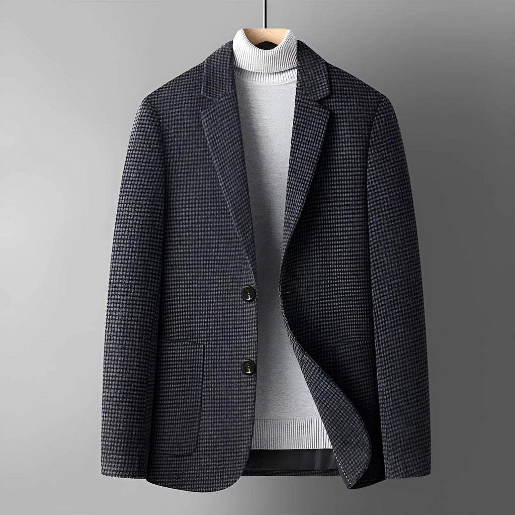 A man wearing a slim-fit grey wool blend suit jacket for autumn and winter leisure wear.