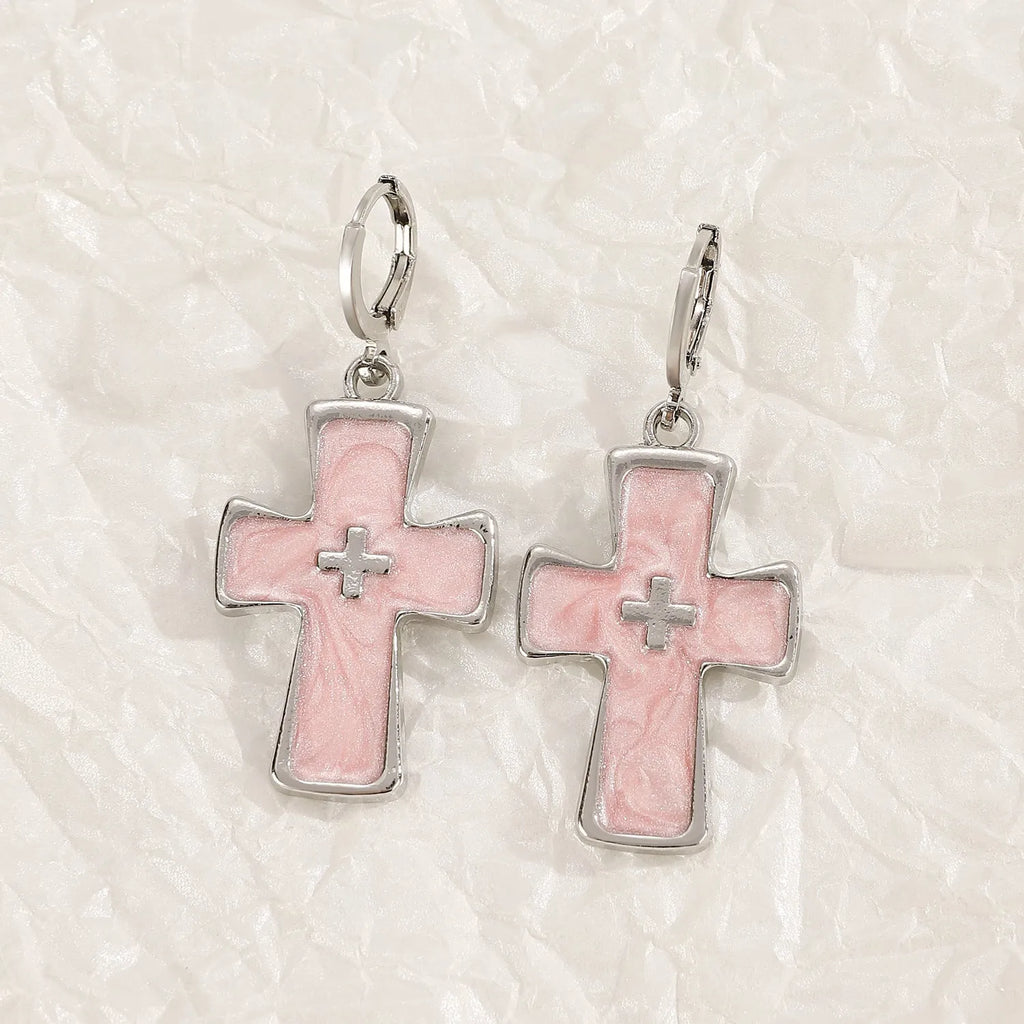 Women's cross crystal earrings with dripping oil treatment in white, black, and silver colour variations