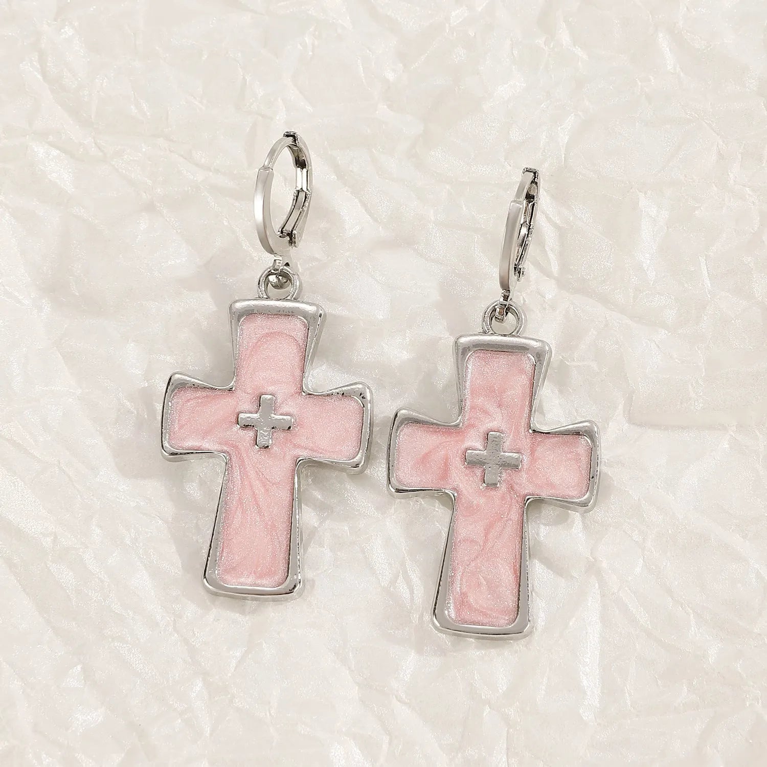 Women's cross crystal earrings with dripping oil treatment in white, black, and silver colour variations