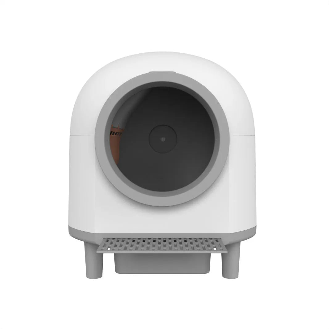 White automatic enclosed cat litter box with dimensions 556mm by 512mm by 590mm.