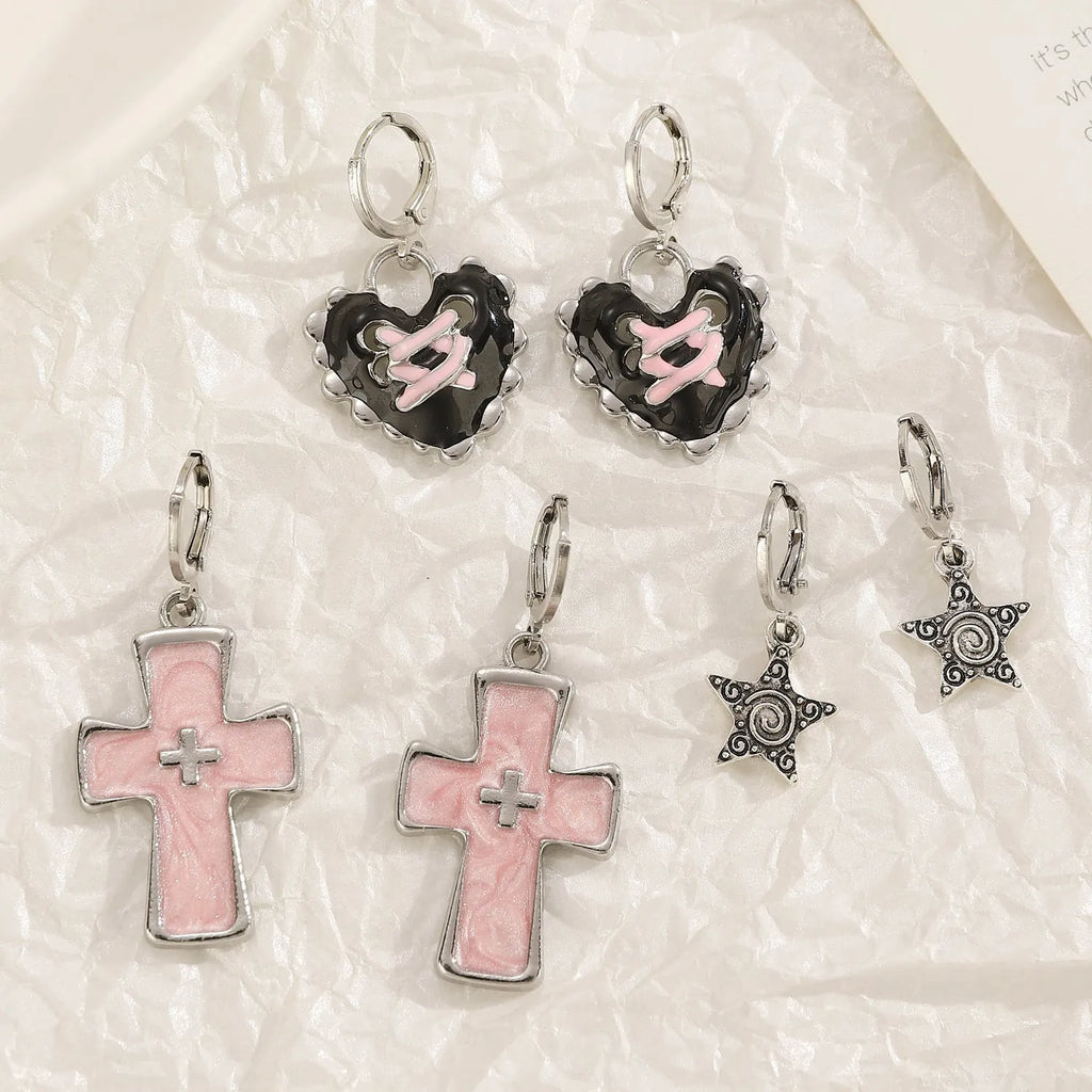 Women's cross crystal earrings with dripping oil treatment in white, black, and silver colour variations