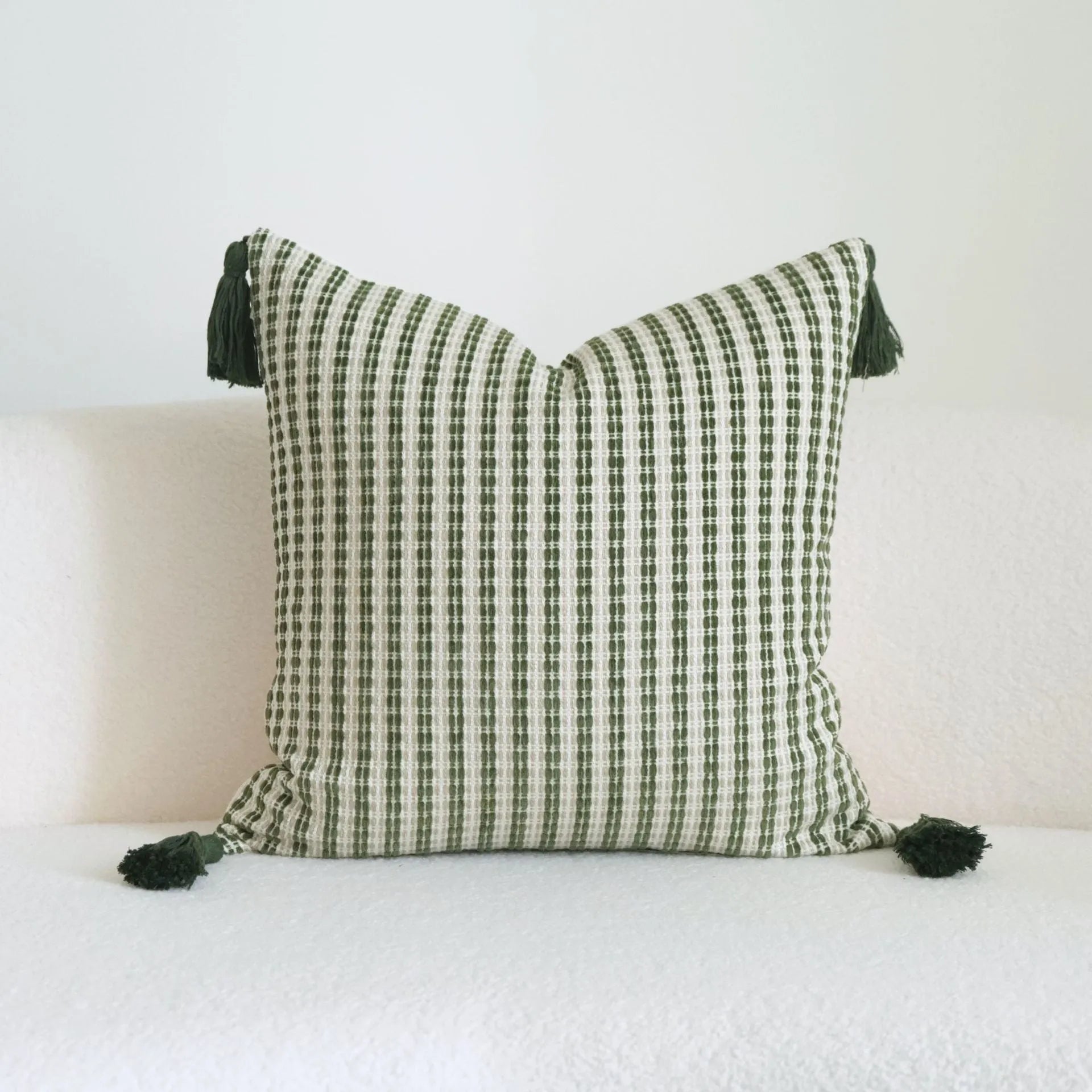 Green cotton linen hotel sample pillow with tassel decoration and silk floss filling