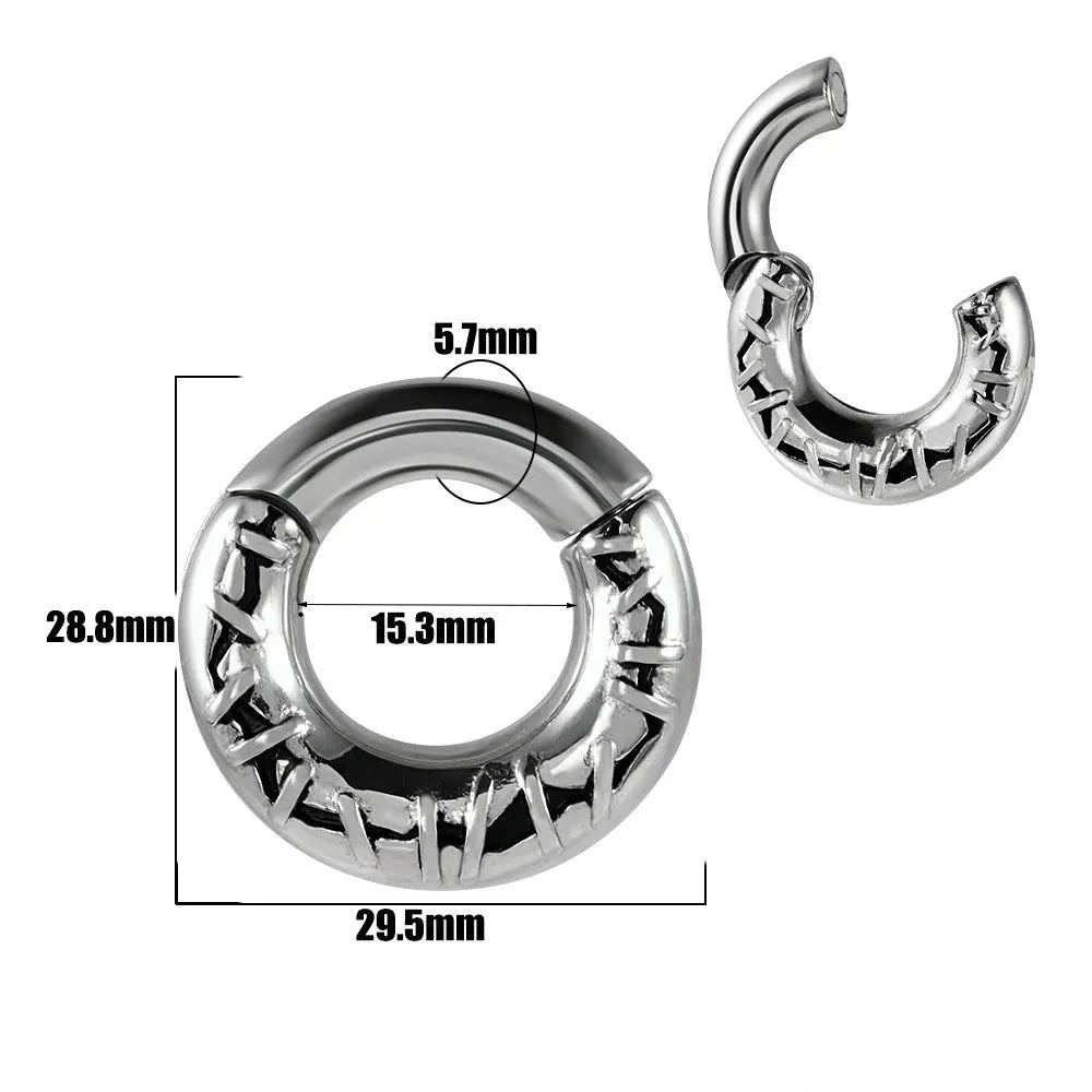 A pair of stainless steel fashion earrings with an intricate totem pattern design in a silver-toned finish.