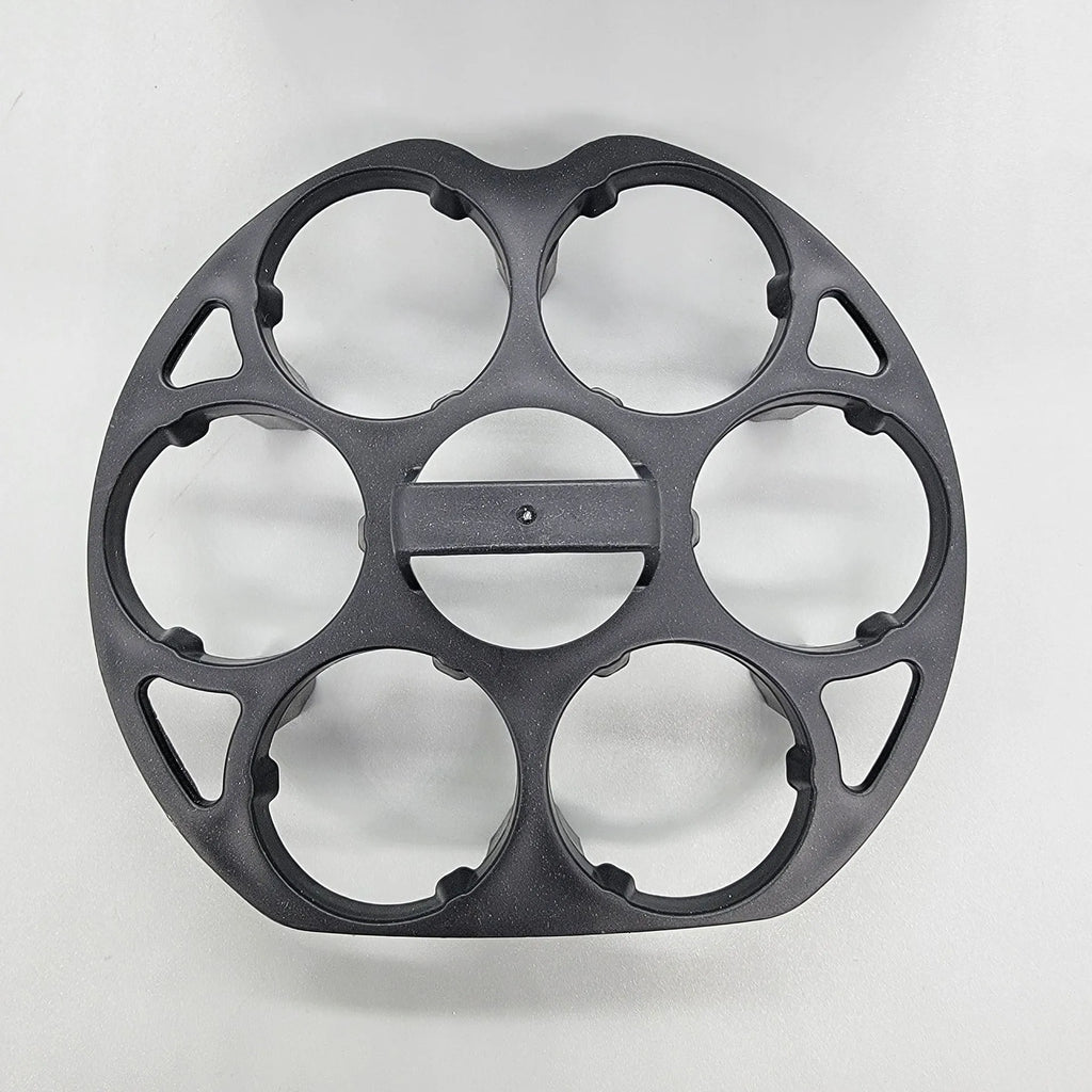 Black plastic egg holder rack with modern design for kitchen organisation.