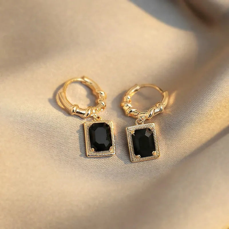 Pair of black zircon and copper geometric quadrilateral earrings in retro French Court style.