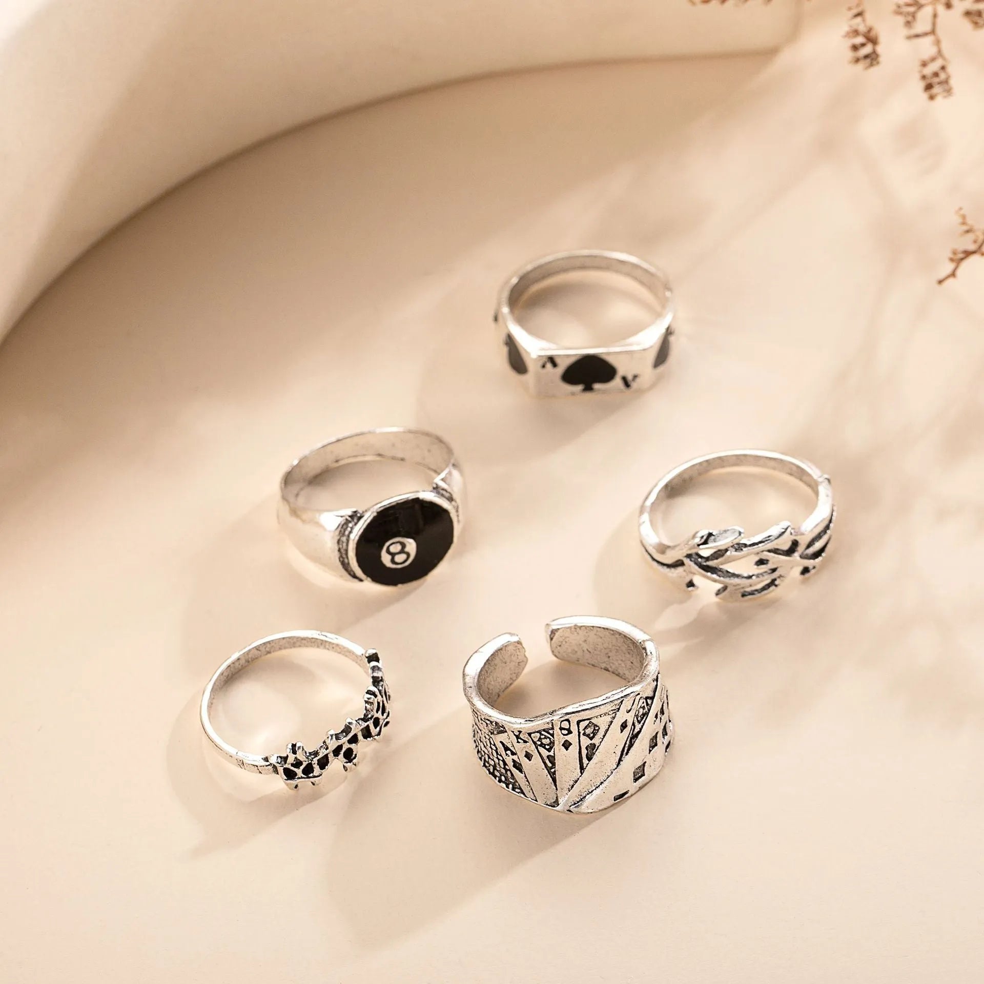 Black alloy poker ring with retro spade design, adjustable sizing for women