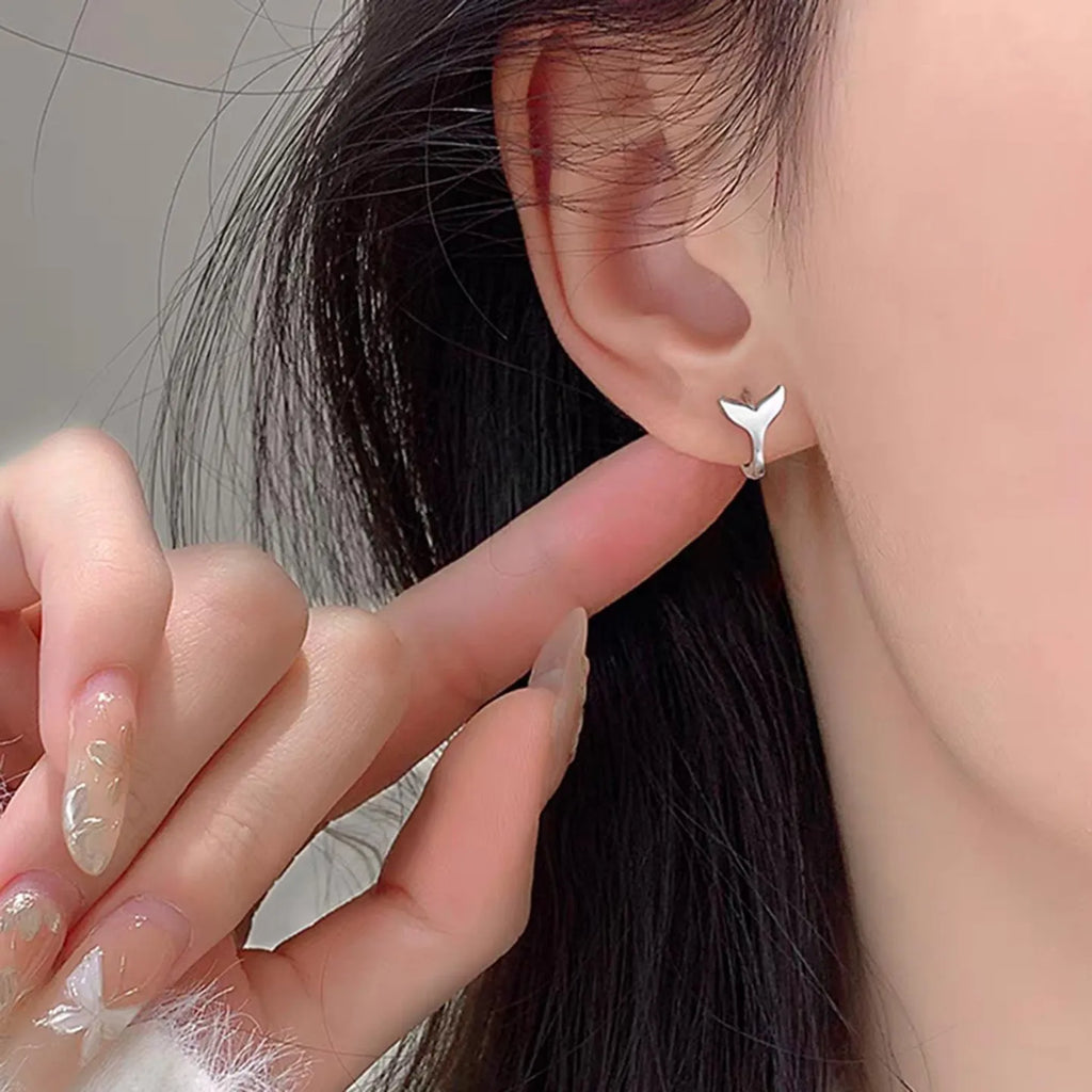 Women's fashion earrings with fishtail design in copper with electroplated white gold or yellow gold finish