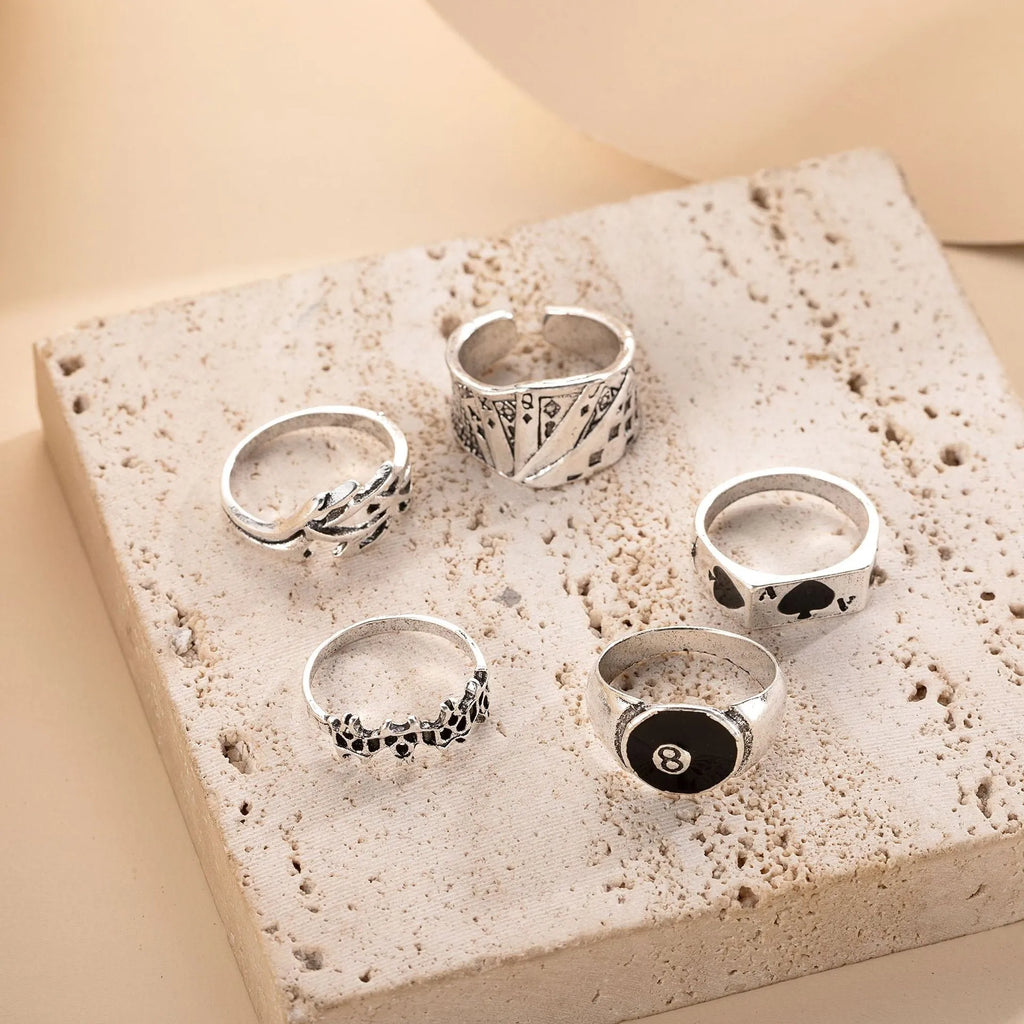 Black alloy poker ring with retro spade design, adjustable sizing for women