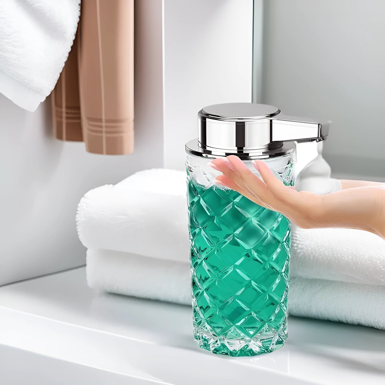 Silver automatic sensor soap dispenser with USB-C charging port on a bathroom counter.