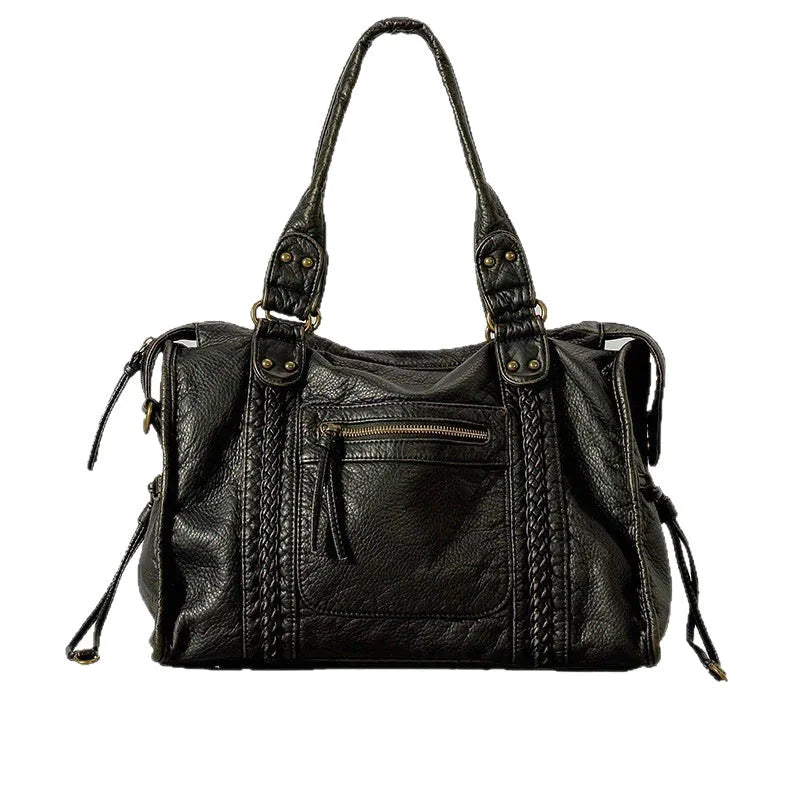 Women's brown retro motorcycle style messenger bag with woven texture and single shoulder strap