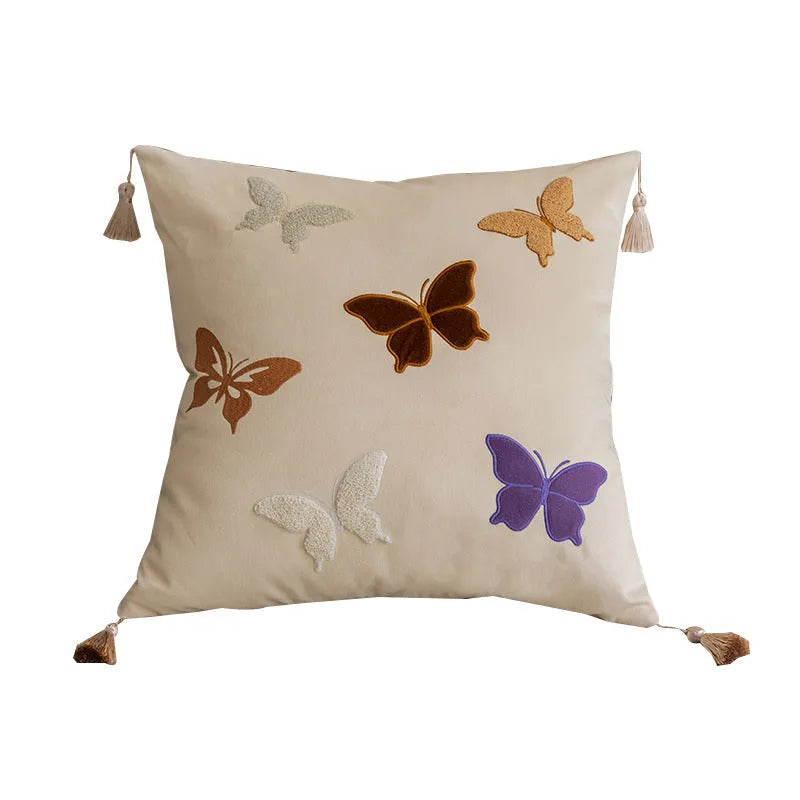 Square embroidered cushion with butterfly floral pattern in Chinese style, shown in beige colour.