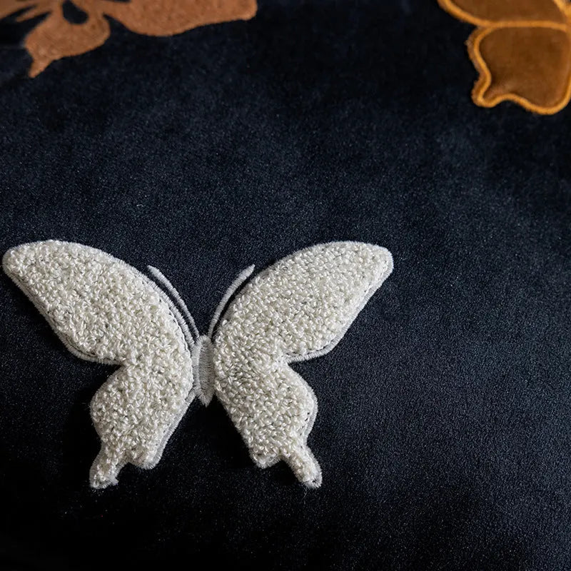 Square embroidered cushion with butterfly floral pattern in Chinese style, shown in beige colour.