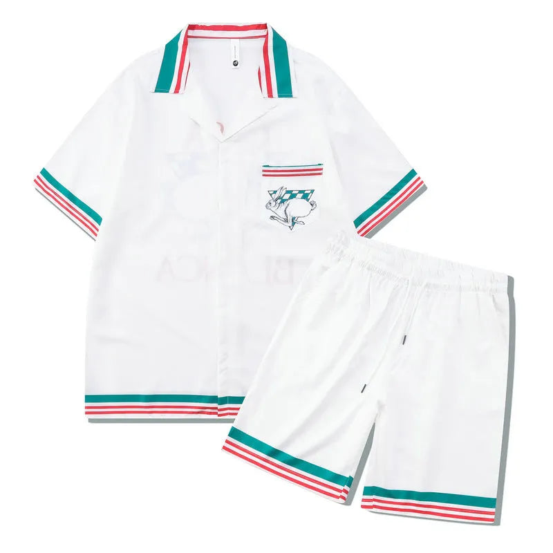 Plaid printed beach outfit for men, consisting of a short sleeve shirt and matching shorts.