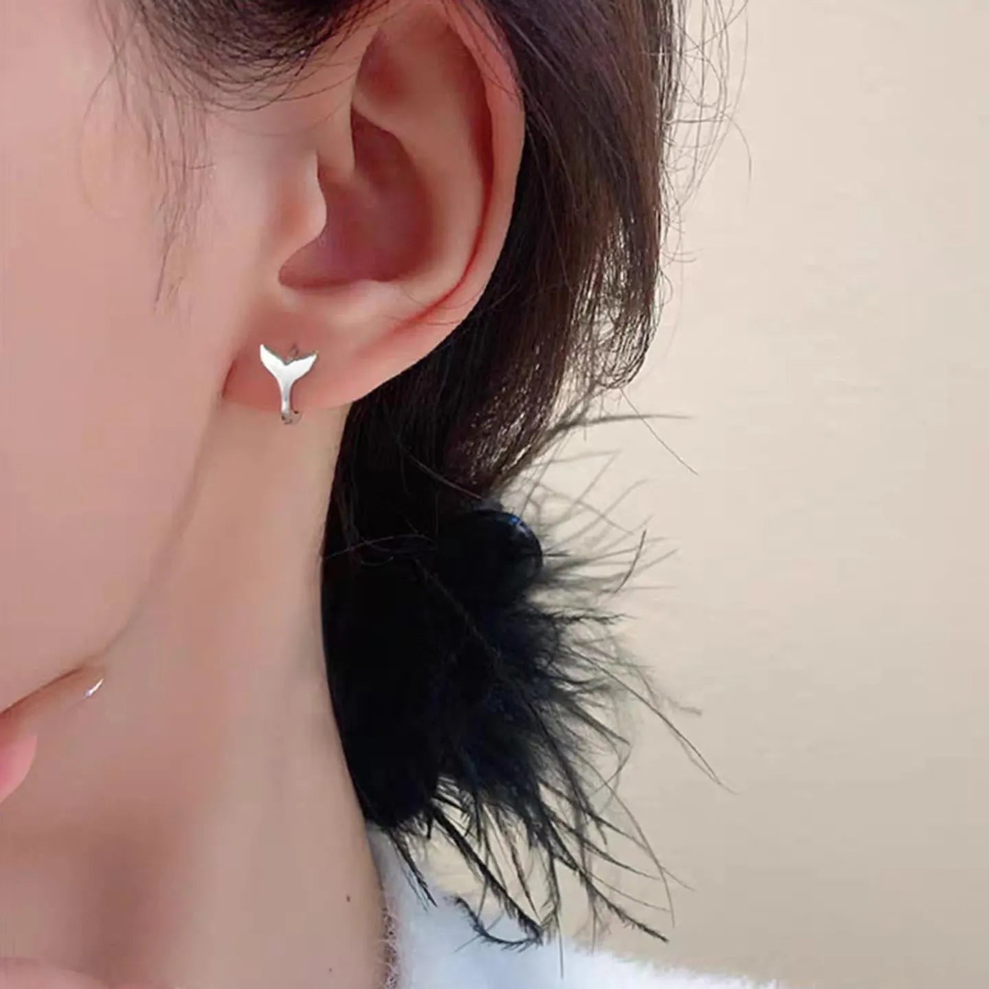 Women's fashion earrings with fishtail design in copper with electroplated white gold or yellow gold finish