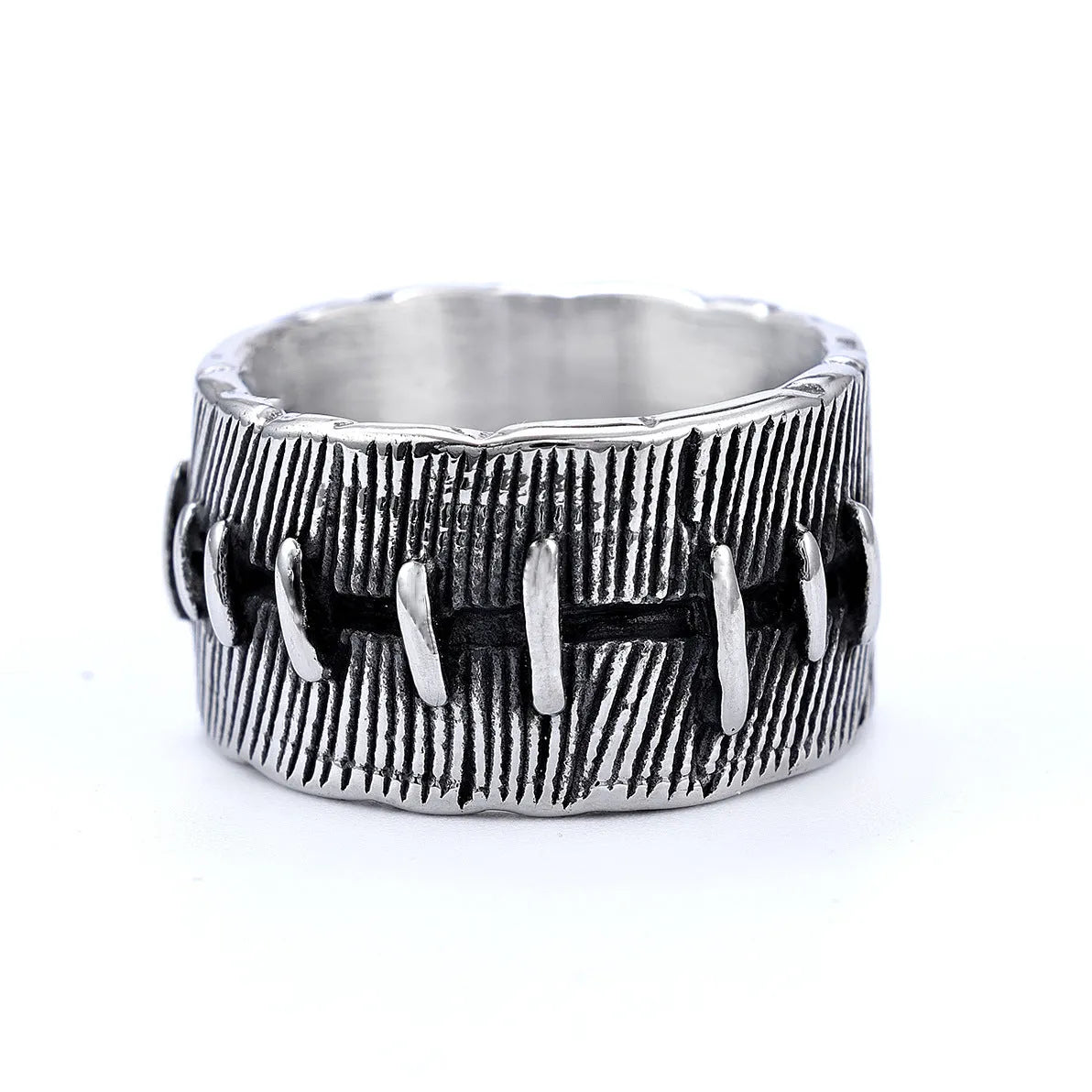 Titanium steel geometric U-shaped double ring in retro black colour, showing stitched design detail.