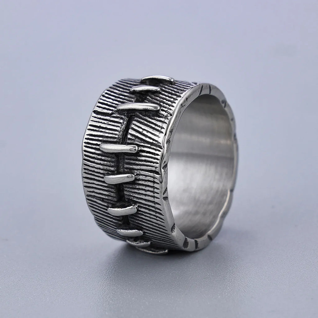 Titanium steel geometric U-shaped double ring in retro black colour, showing stitched design detail.