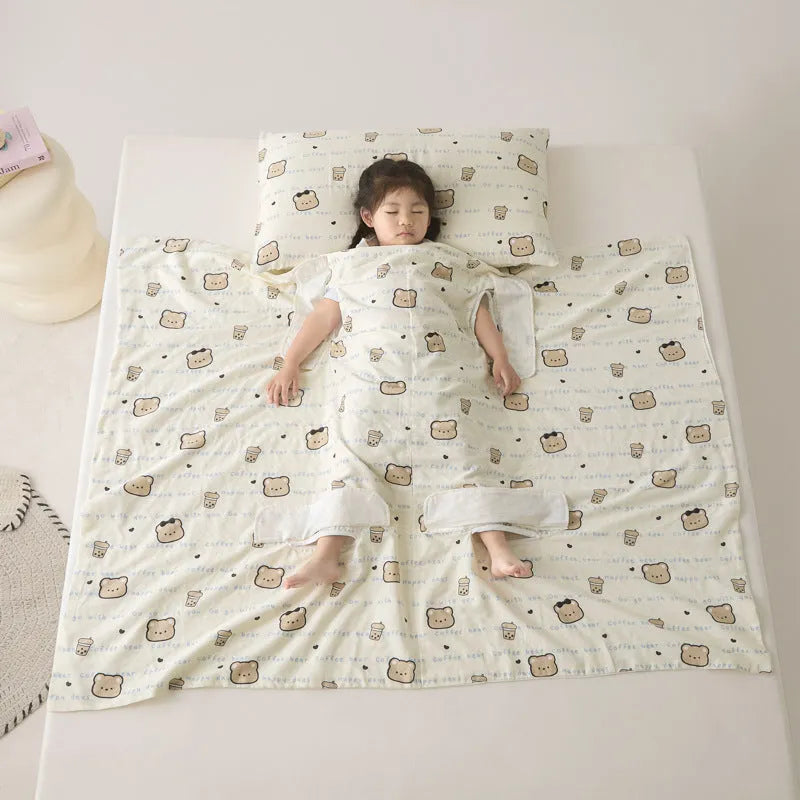 Colourful patterned anti-kick sleeping bag blanket folded to show size and design.