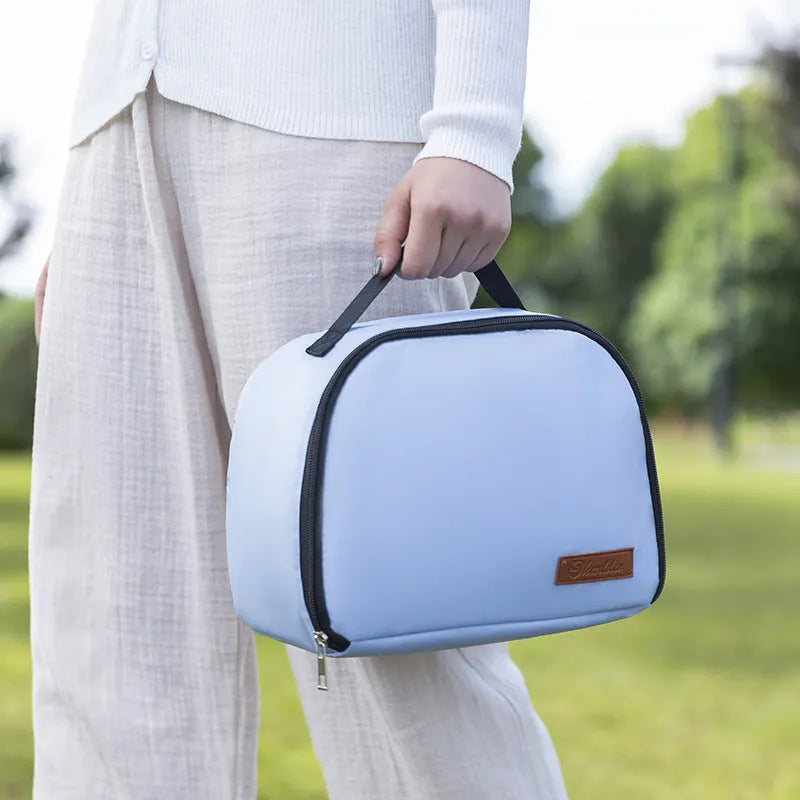 Insulated large capacity bento handbag in textured cloth, shown in purple colour.