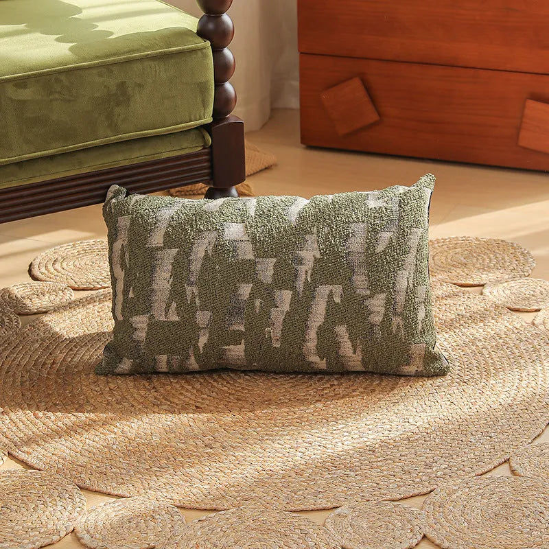 Square pillow cover with woven plant pattern in Nordic style, shown on a sofa as a waist pillow.