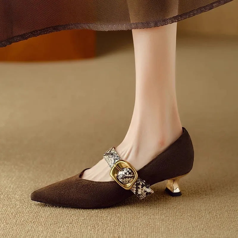 Black women's stiletto high heel shoes with pointed toe and buckle fastening