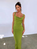 Backless slim fit milk silk sling dress in champagne colour on a model.